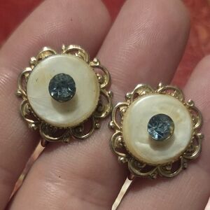 Elegant Gold and Cream Earrings with Blue Accent